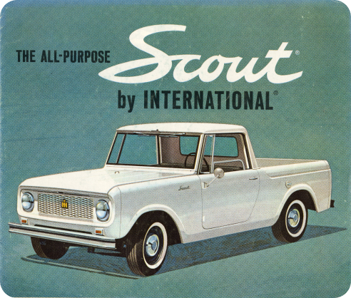 A family with their pickup truck in the mountains