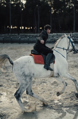 A family with their pickup truck in the mountains