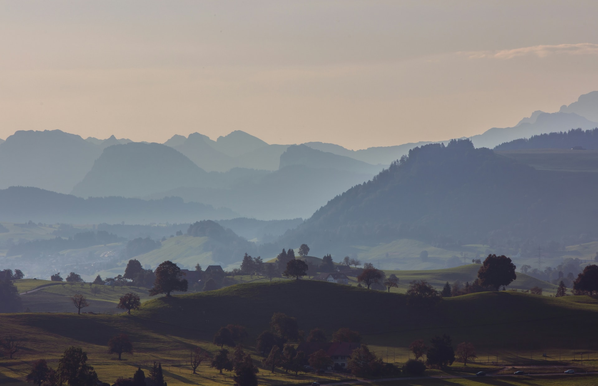 A family with their pickup truck in the mountains